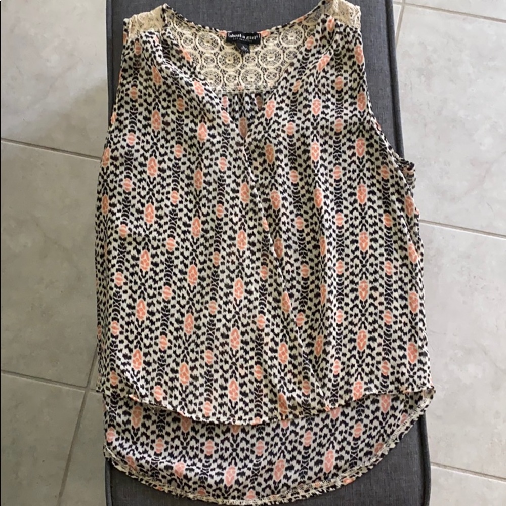 Sheer tank top with lace embellishment
